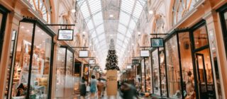 aisle in a mall at Christmas time.