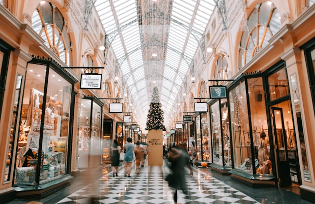 aisle in a mall at Christmas time.