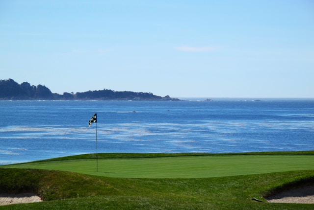 golf green overlooking an ocean view.