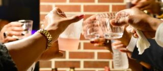 group of friends toasting their glasses.