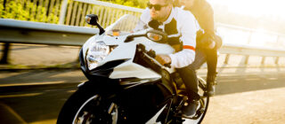 couple out for a ride on motorcycle