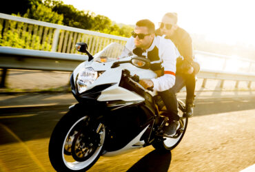 couple out for a ride on motorcycle