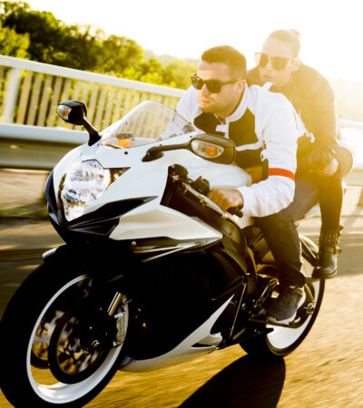 couple out for a ride on motorcycle