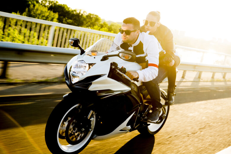 couple out for a ride on motorcycle