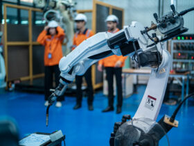 robotics engineers working on robot arm