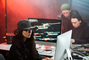 young woman hacking a computer