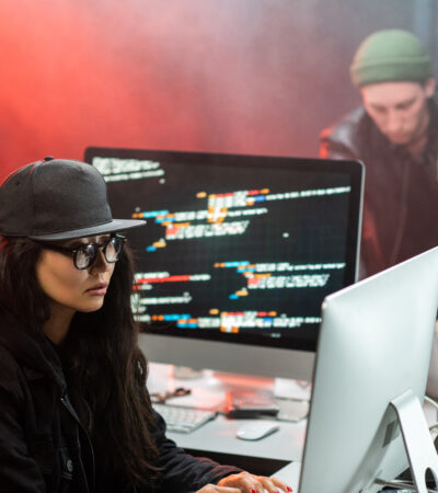 young woman hacking a computer