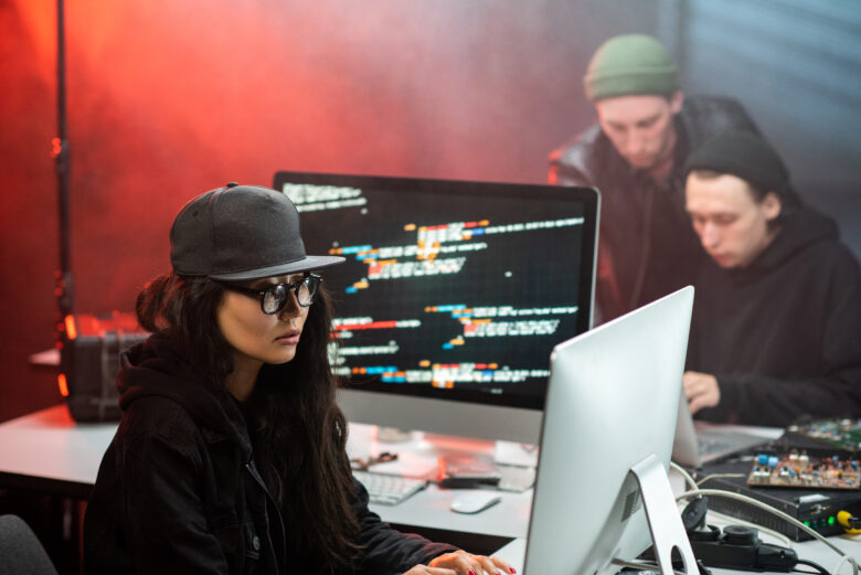 young woman hacking a computer